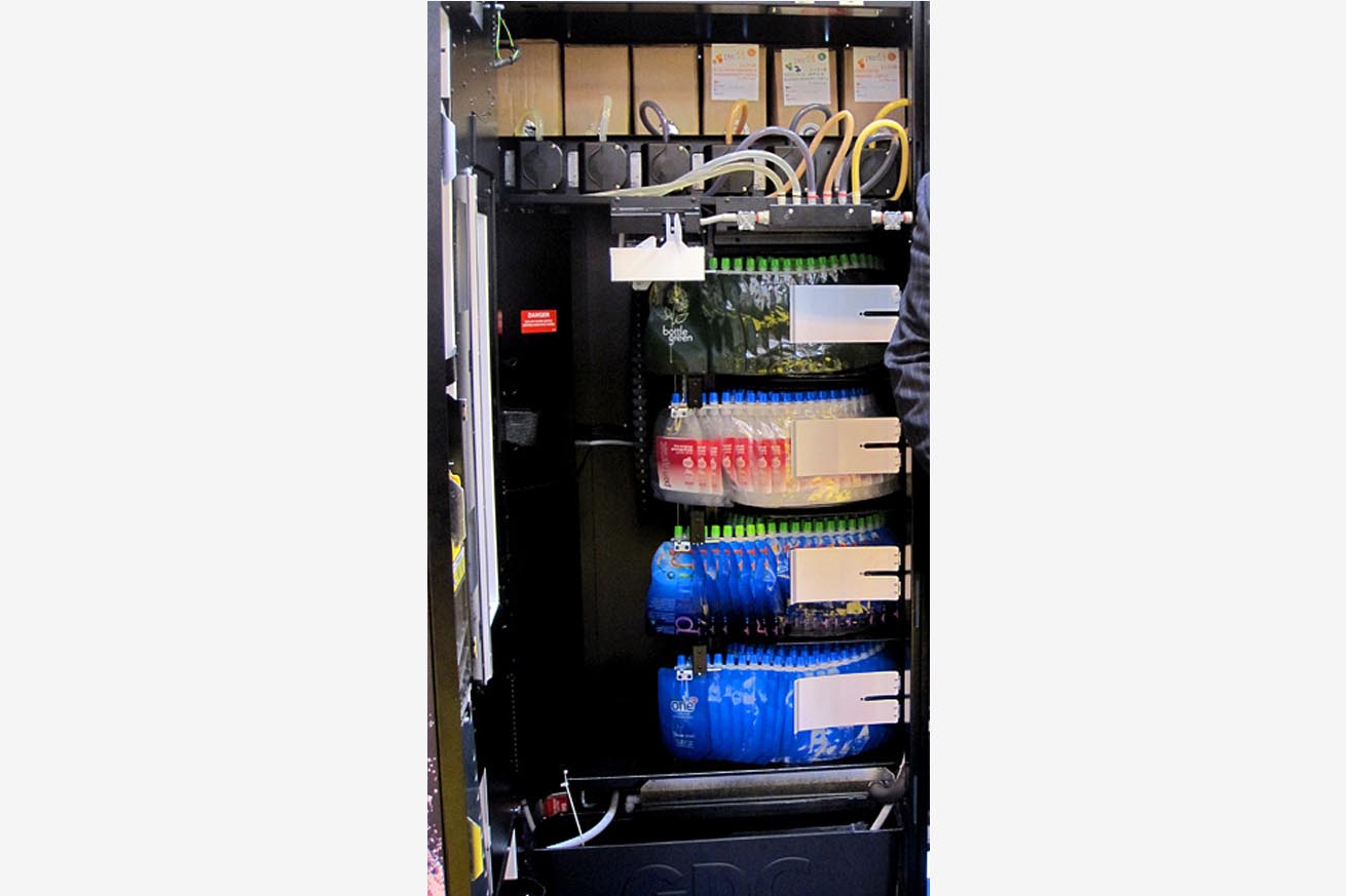 clamshell peristaltic pumps in a beverage machine